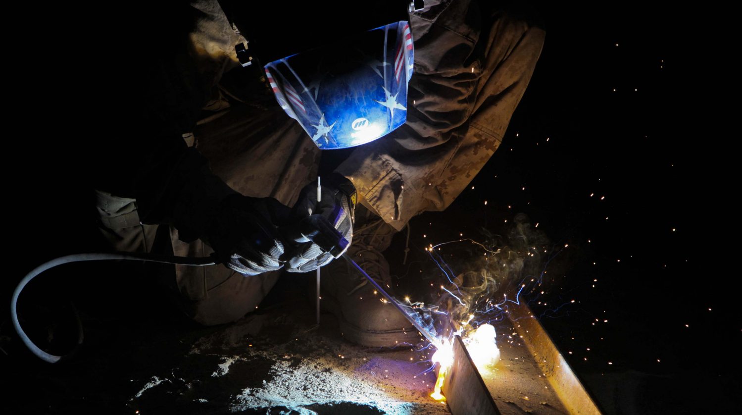 Man welding metal